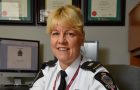 Sheree Ortman of Regina Police Sevice, seated at desk