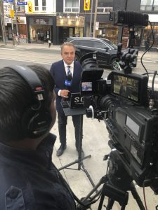 In his role as consumer reporter, O'Shea has exposed 
organized crime figures, scam artists, and unscrupulous contractors at frequent risk. He was once assaulted on-air by biker 
gang members who attacked him with a fire extinguisher. Shown here reporting from Toronto in 2020. 
