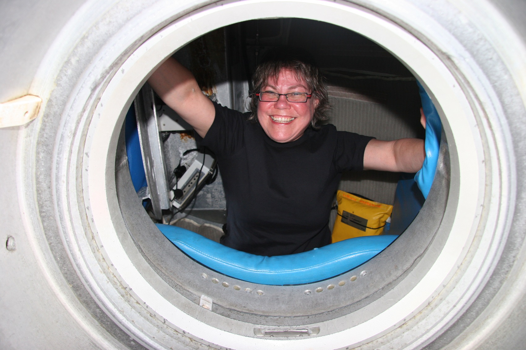  Mitchell is all smiles in the submersible that took her to the bottom of the sea.