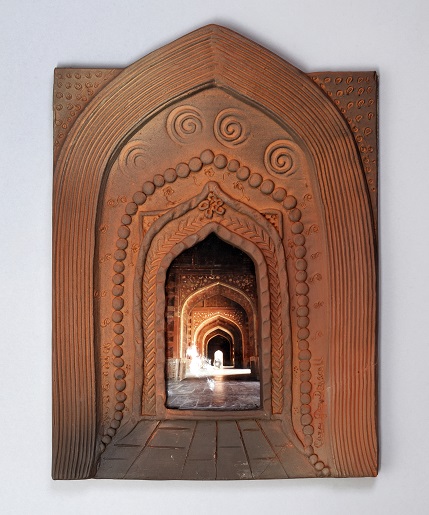 <small>Cara Gay Driscoll (b. 1946), Arches, c. 2000, ceramic, photograph, bead. Gift of Dr. Morris C. Shumiatcher, O.C., S.O.M., Q.C. and Dr. Jacqui Clay Shumiatcher, S.O.M., C.M. © Cara Gay Driscoll. Reproduced with permission. Photograph by the University of Regina.
</small>