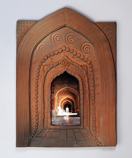 <small>Cara Gay Driscoll (b. 1946), Arches, c. 2000, ceramic, photograph, bead. Gift of Dr. Morris C. Shumiatcher, O.C., S.O.M., Q.C. and Dr. Jacqui Clay Shumiatcher, S.O.M., C.M. © Cara Gay Driscoll. Reproduced with permission. Photograph by the University of Regina.
</small>