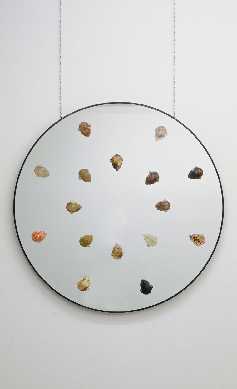 <small>Audie Murray (b. 1993), Sacred Selfie, 2019, mirror, resin casting, various materials, 40" x 35". University of Regina, President's Art Collection (Annual Indigenous Acquisition). © Audie Murray. Photo: Courtesy Fazakas Gallery. Photograph by Dana Qaddah. Reproduced with permission.
</small>