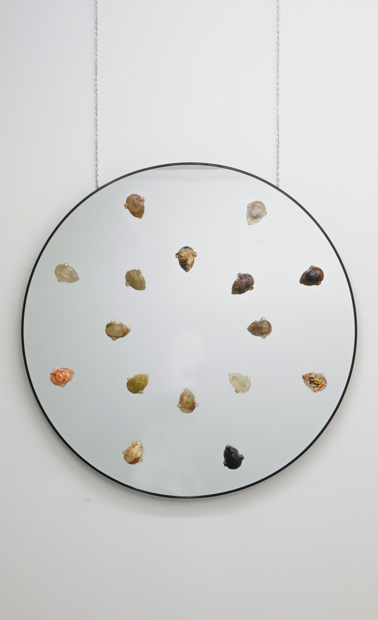 <small>Audie Murray (b. 1993), Sacred Selfie, 2019, mirror, resin casting, various materials, 40" x 35". University of Regina, President's Art Collection (Annual Indigenous Acquisition). © Audie Murray. Photo: Courtesy Fazakas Gallery. Photograph by Dana Qaddah. Reproduced with permission.
</small>