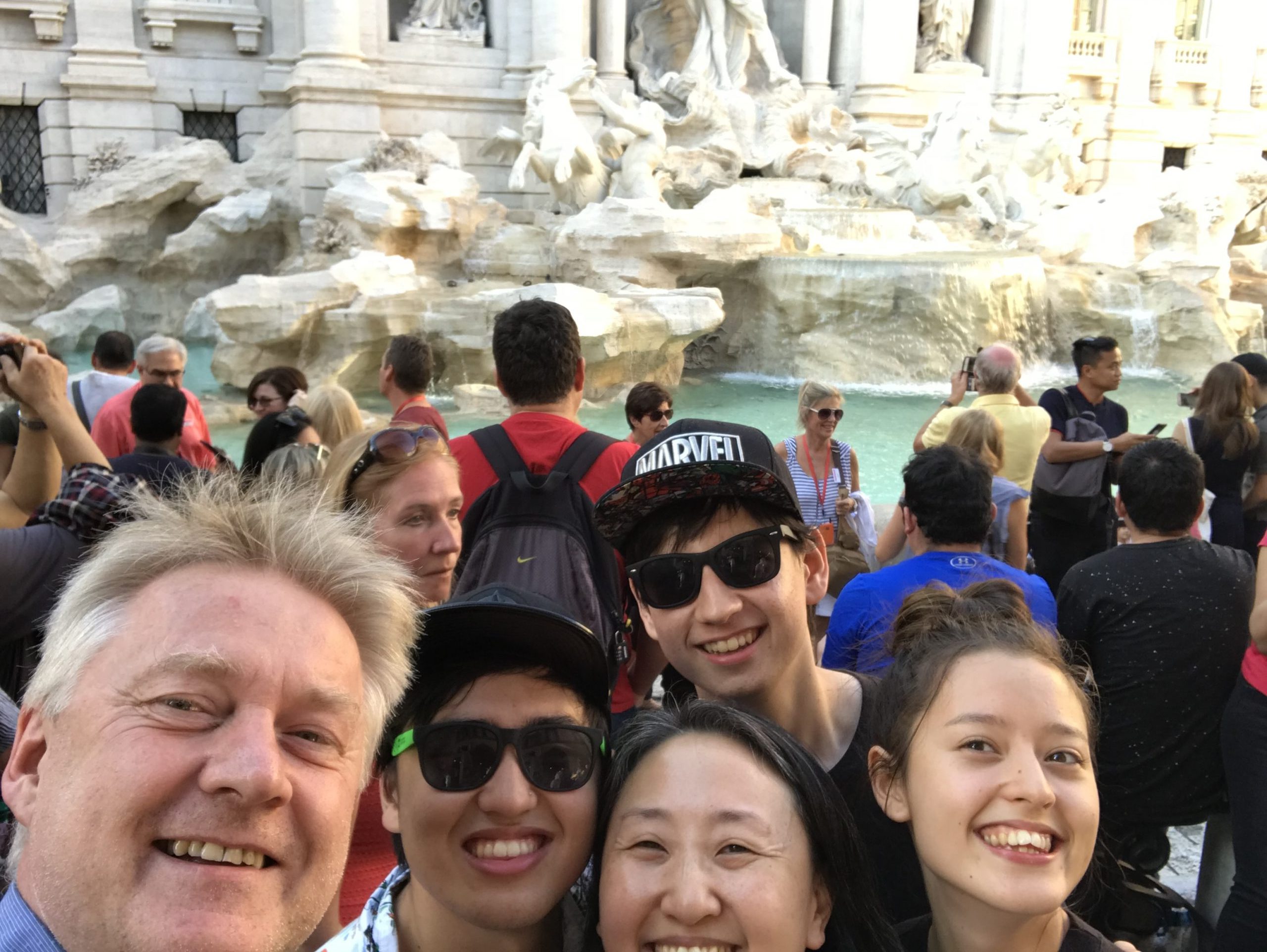 The Heese family takes a selfie while on vacation in Rome in front of the Trevi Fountain. 
