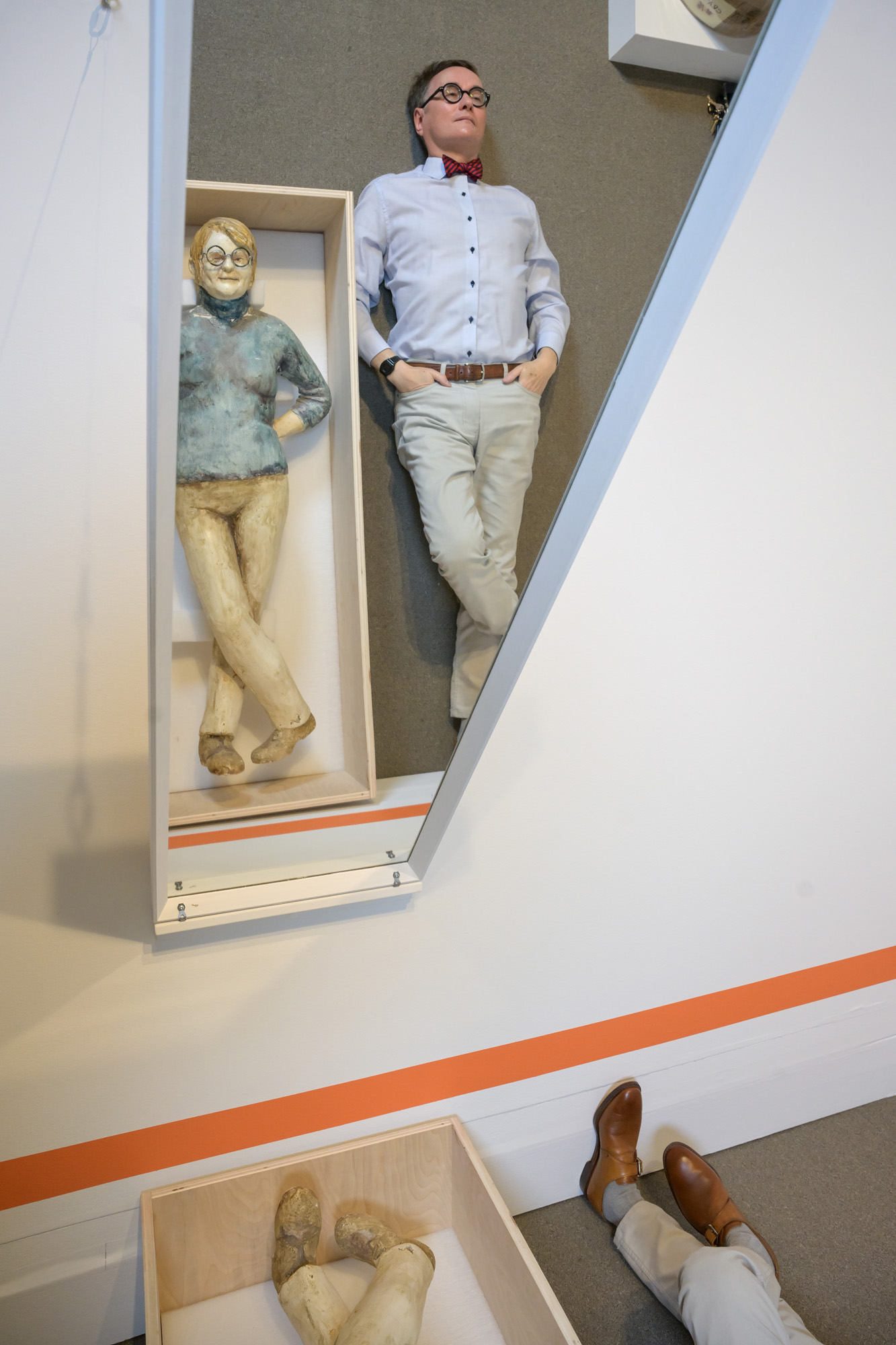 _URE5899 new Timothy Long in repose next to a sculpture of Maija Bismanis by Joe Fafard.