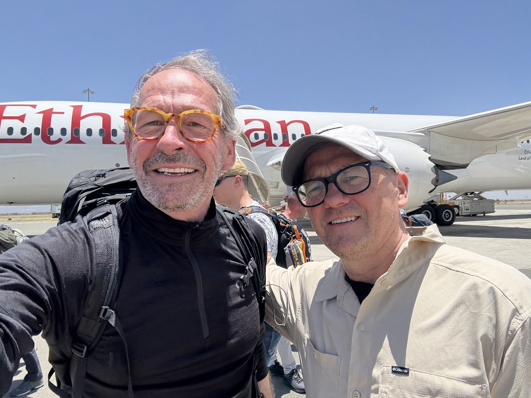 IMG_0401 The author (left) and Marcel Asselin arrive at Kilimanjaro International Airport, three days before they begin their assult on Mount Kilimanjaro.