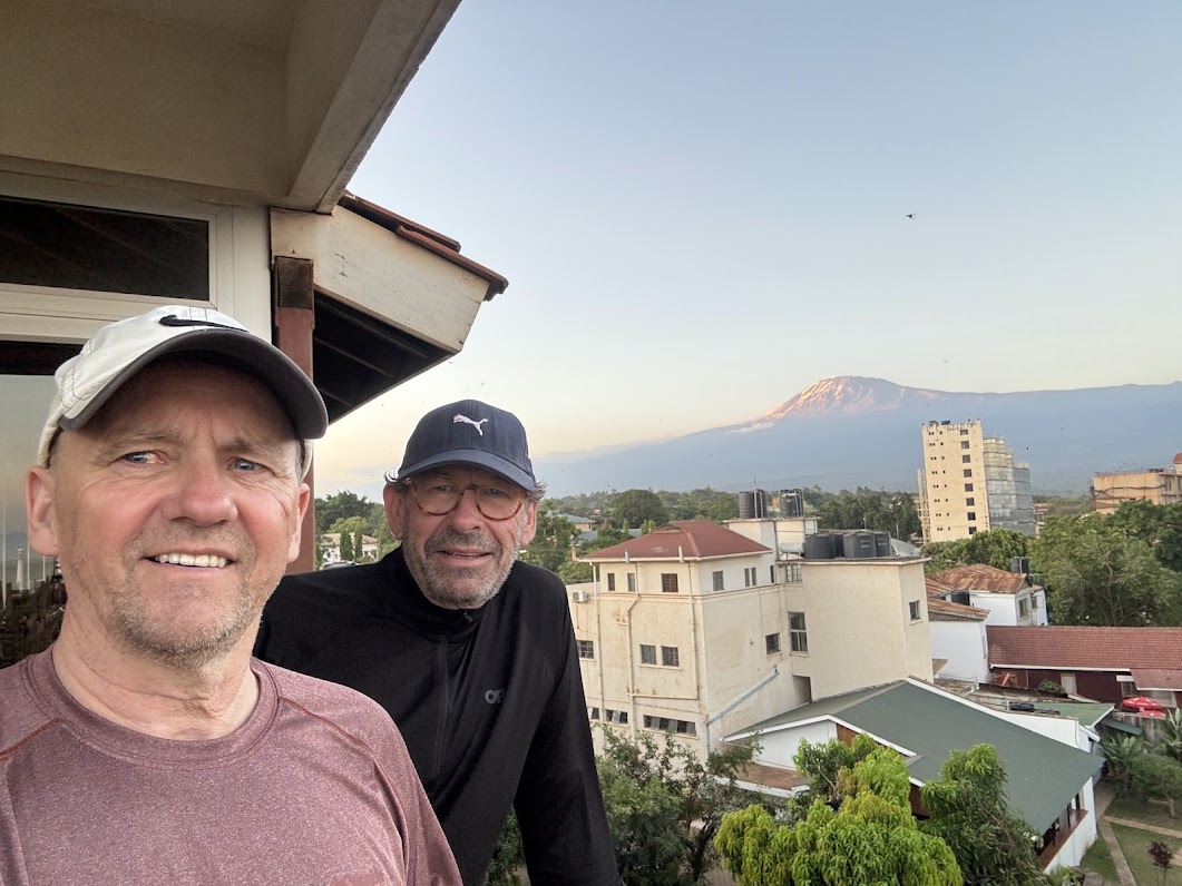 IMG_0999 Mount Kilimanjaro looms over Moshi, Tanzania where Asselin and Campbell began their Tanzanian adventrure. Nine days after this photo was taken, the pair would be standing on the summit of the highest free-standing mountain in the world.