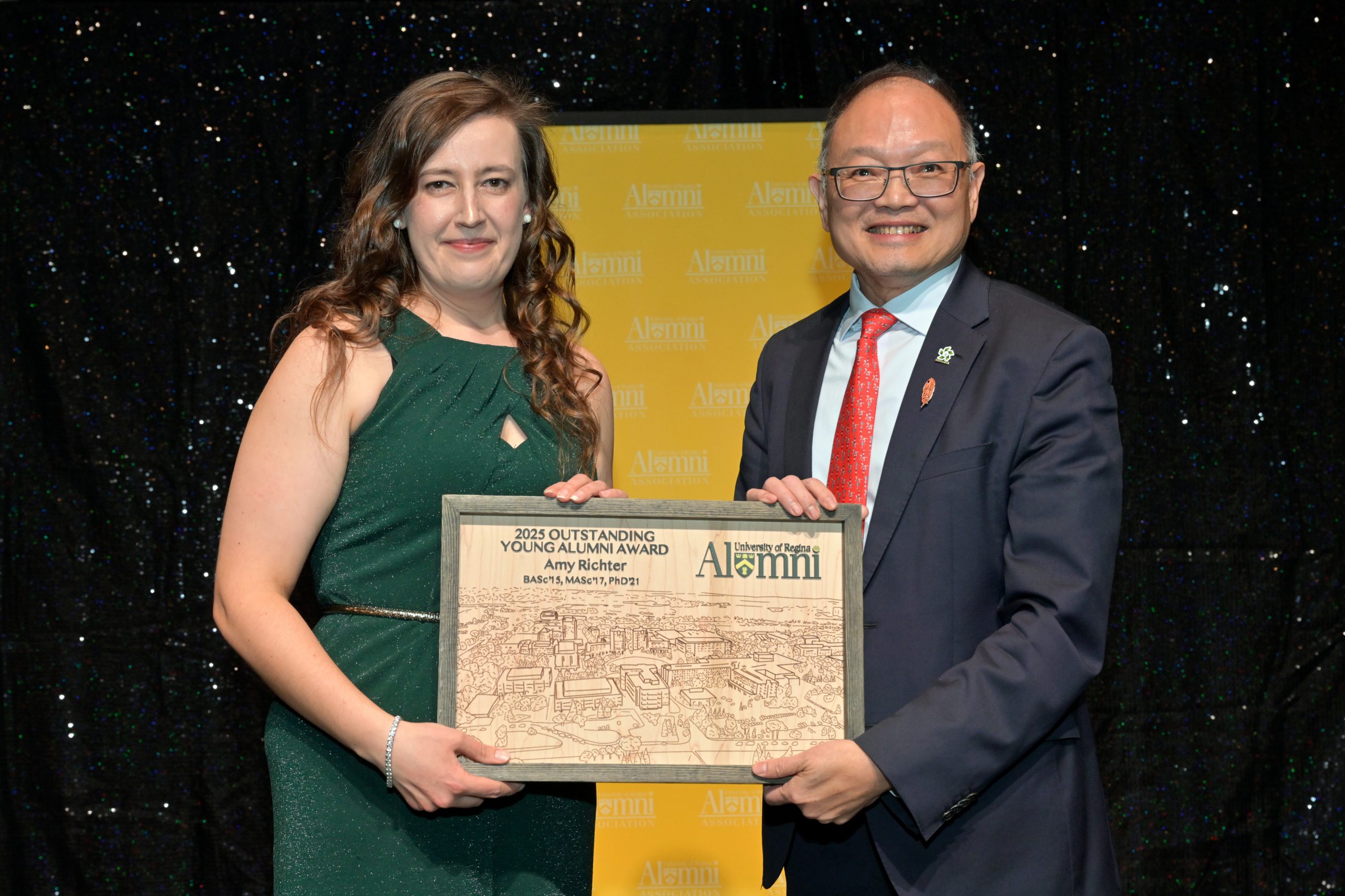 Two smiling individuals