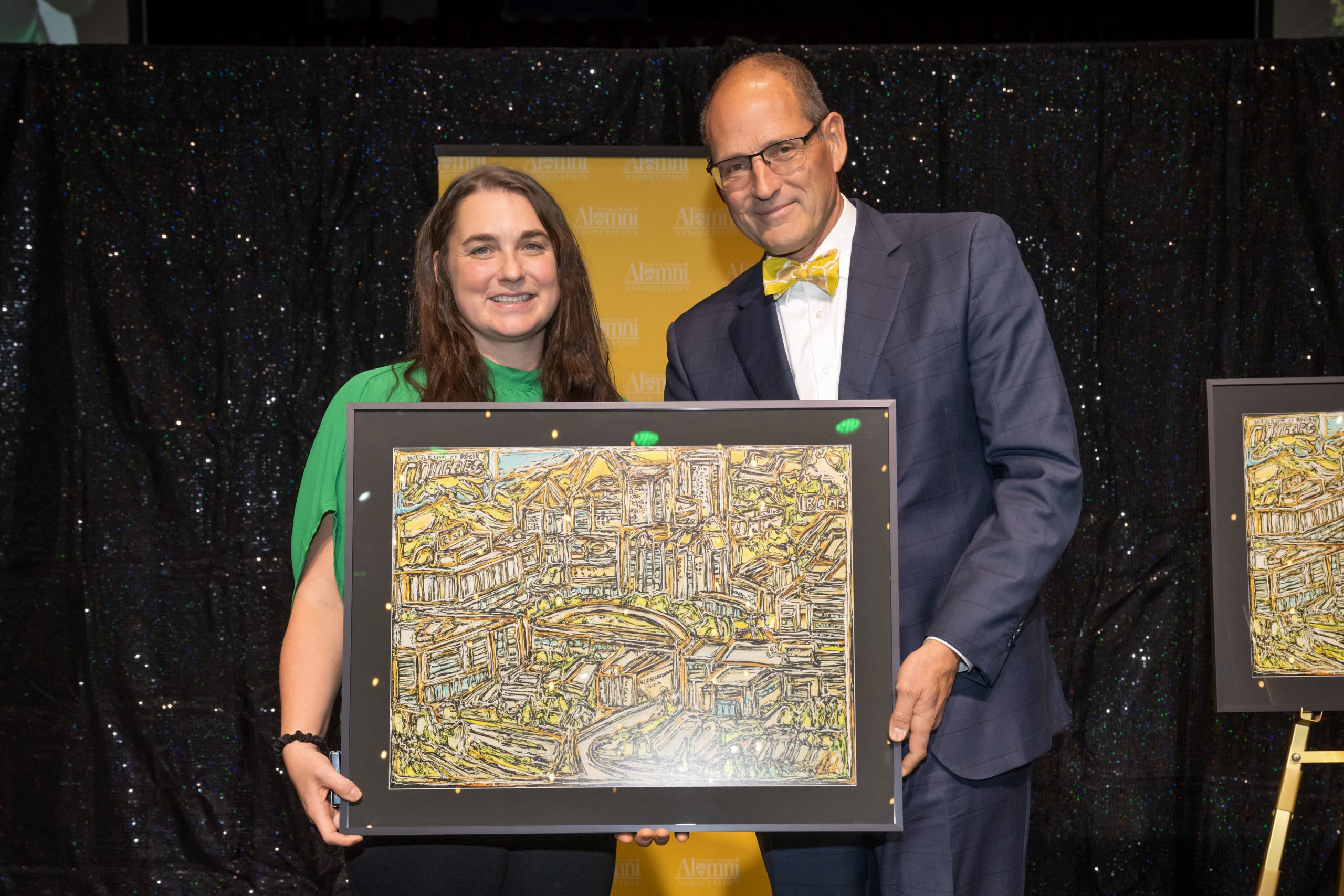 Two smiling individuals