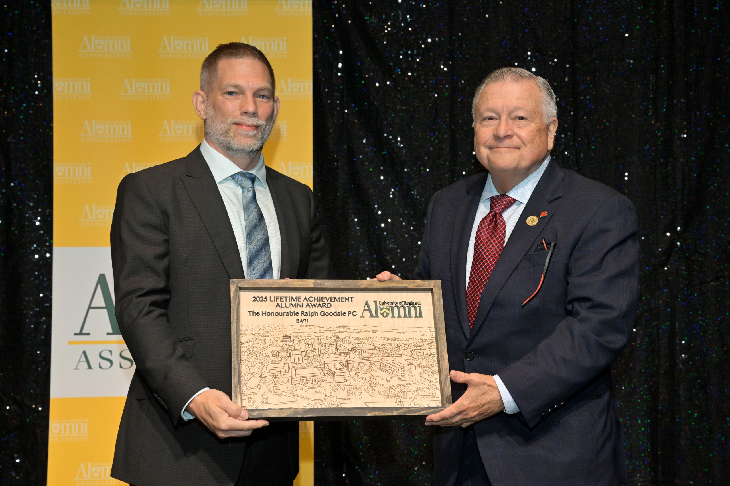 Two smiling individuals